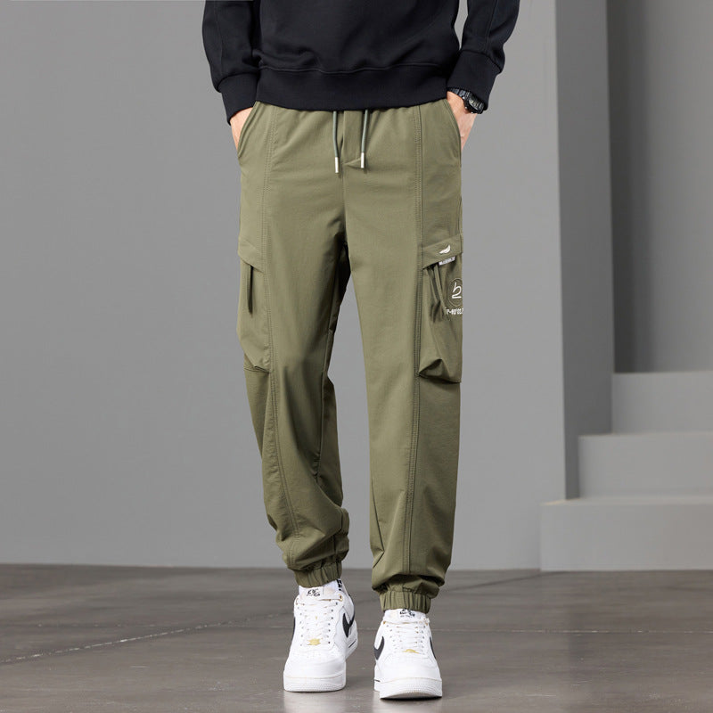 Men's technical cargo jogger pants with elastic hem, multi pockets, and drawstring Chichicherry