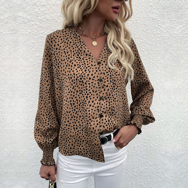 Women's lightweight blouse with V-neck, continuous button placket, and ruffled cuffs Chichicherry