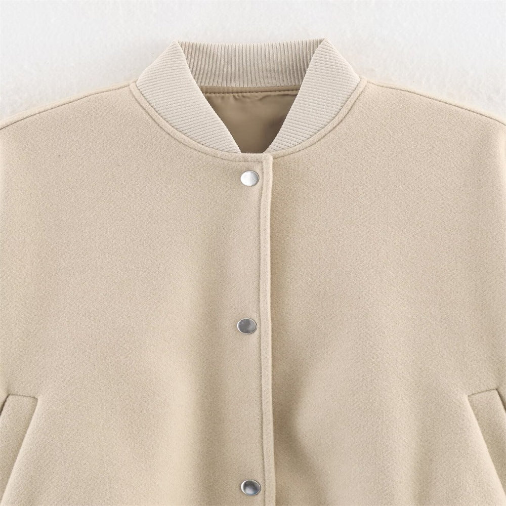Ladies short boxy bomber jacket with ribbed collar, snap button closure, and pockets Chichicherry