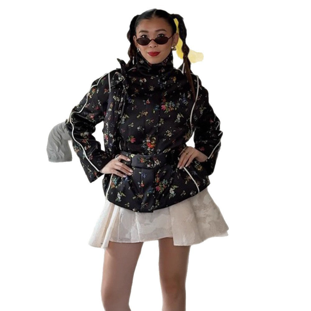 Women's short cut quilted blouson jacket with high standing collar, piping and floral all-over print Chichicherry