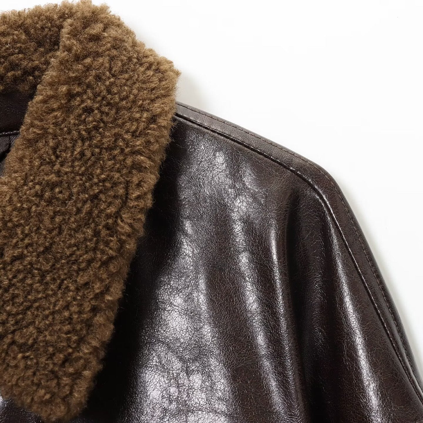 Women's Oversized Faux Leather Jacket with Teddy Collar and Waist Belt Chichicherry