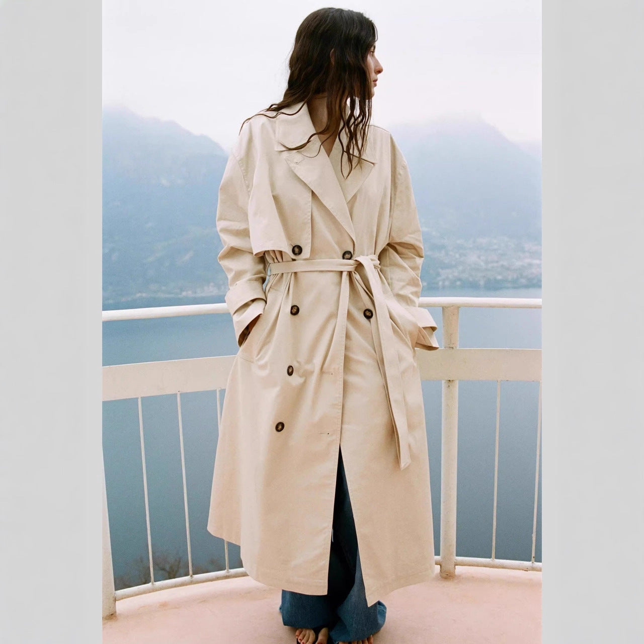 Women's Longer Trench Coat with Double-Breasted Button Placket, Waist Belt and Wide Lapels Chichicherry