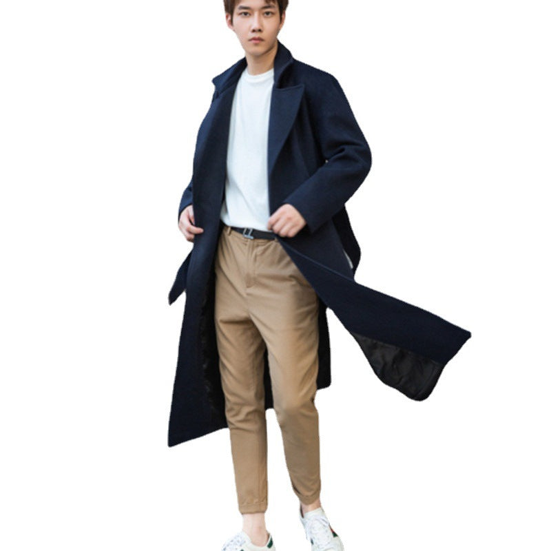 Men's long cut wool coat in minimalist design with generous shawl collar and concealed button placket Chichicherry