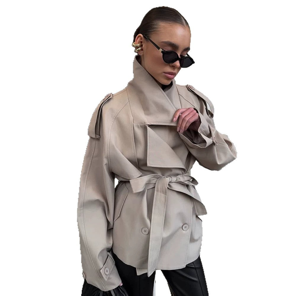 Women's short trench coat with wide standing collar, shoulder epaulettes, and waist belt Chichicherry