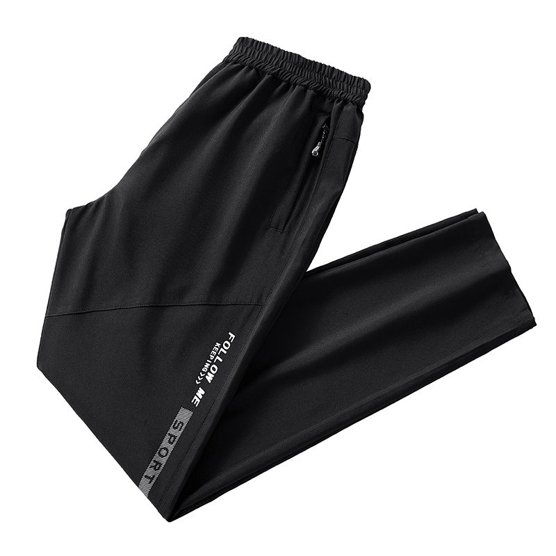 Men's Sportive Tapered Jogging Pants with Elastic Waistband, Zipper Pockets and Breathable Functional Material Chichicherry