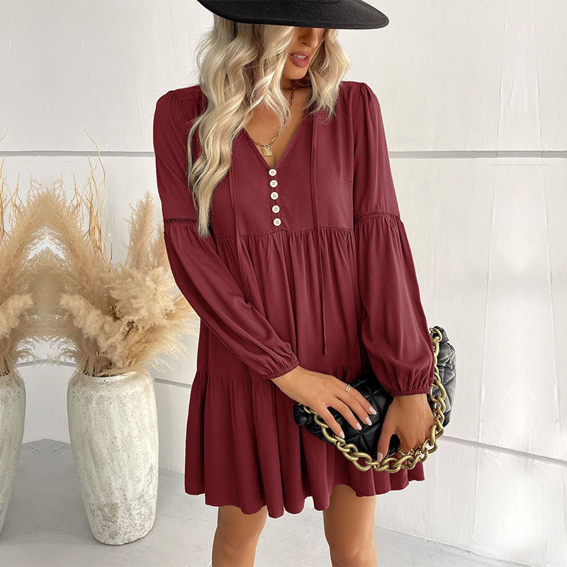 Ladies short-cut tiered babydoll dress with V-neck, button placket and balloon sleeves Chichicherry