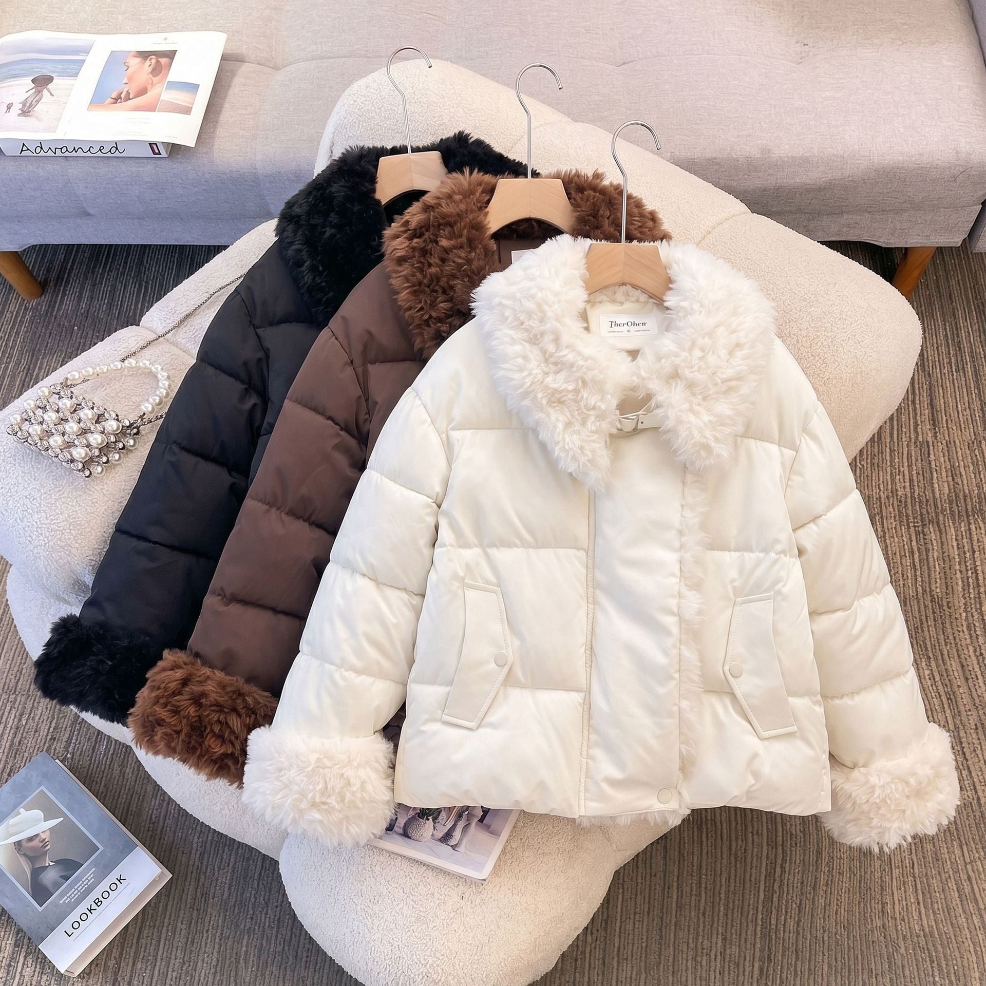 Women's short padded jacket with voluminous faux fur collar and pom pom ties Chichicherry