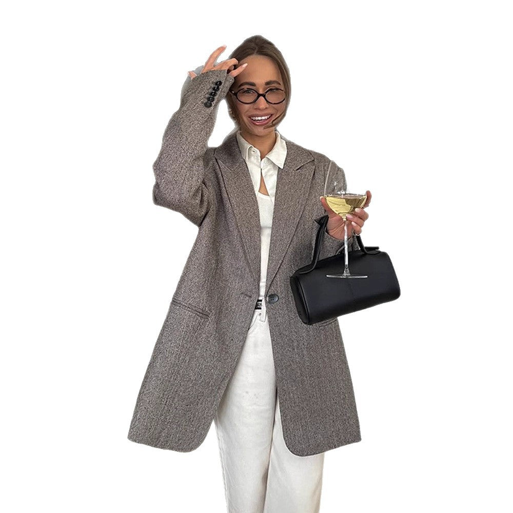 Women's long oversized wool blend coat with single-breasted button placket, notched lapels, and side pockets Chichicherry