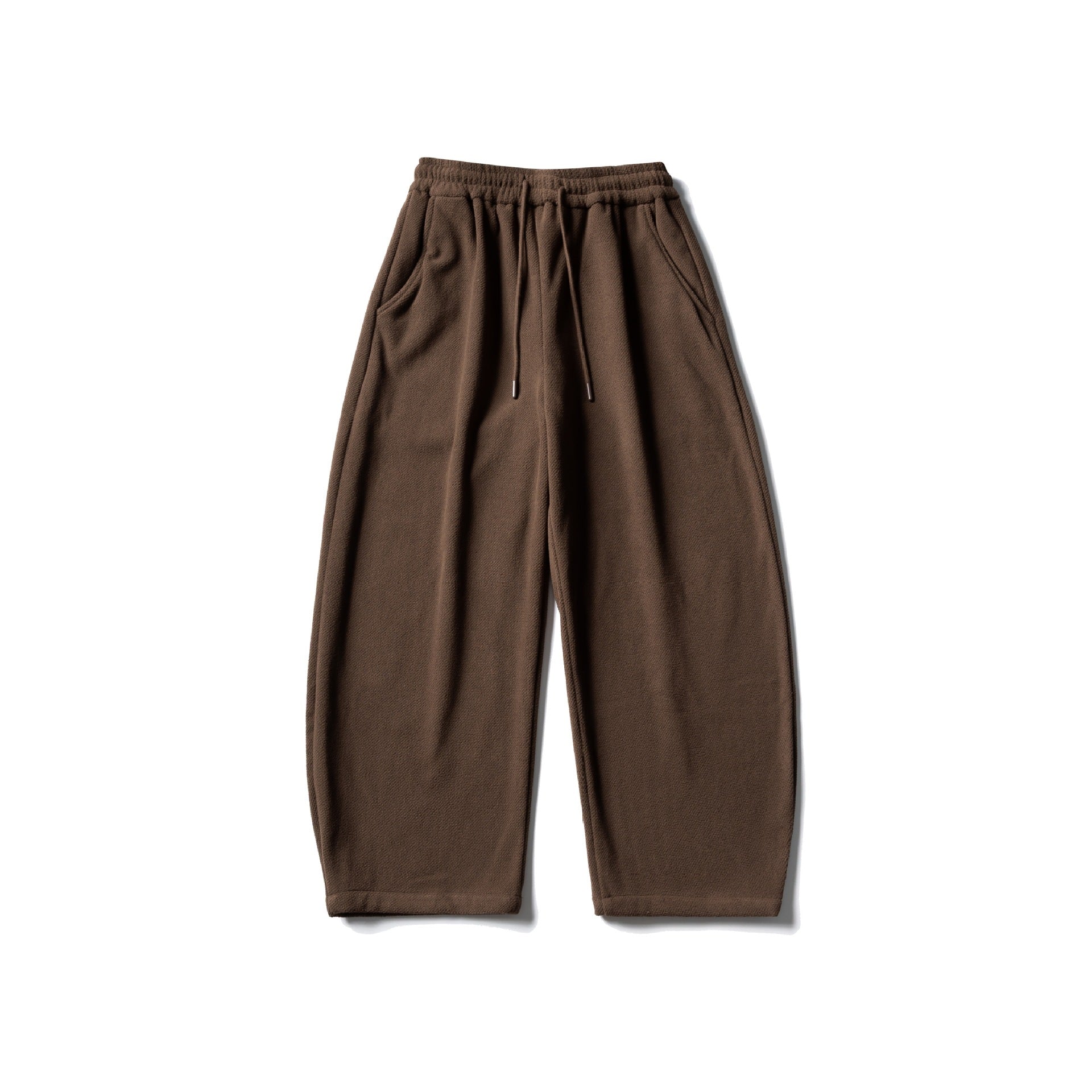 Unisex fleece jogging pants with elastic drawstring waistband, side pockets and tapered leg Chichicherry