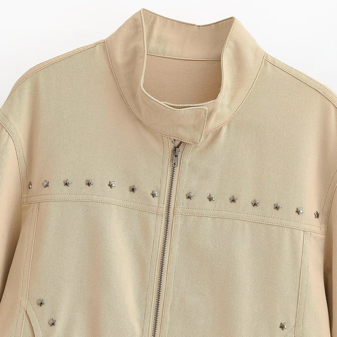 Women’s short-cut vegan leather jacket with stand-up collar, full-length zipper and star stud detail Chichicherry