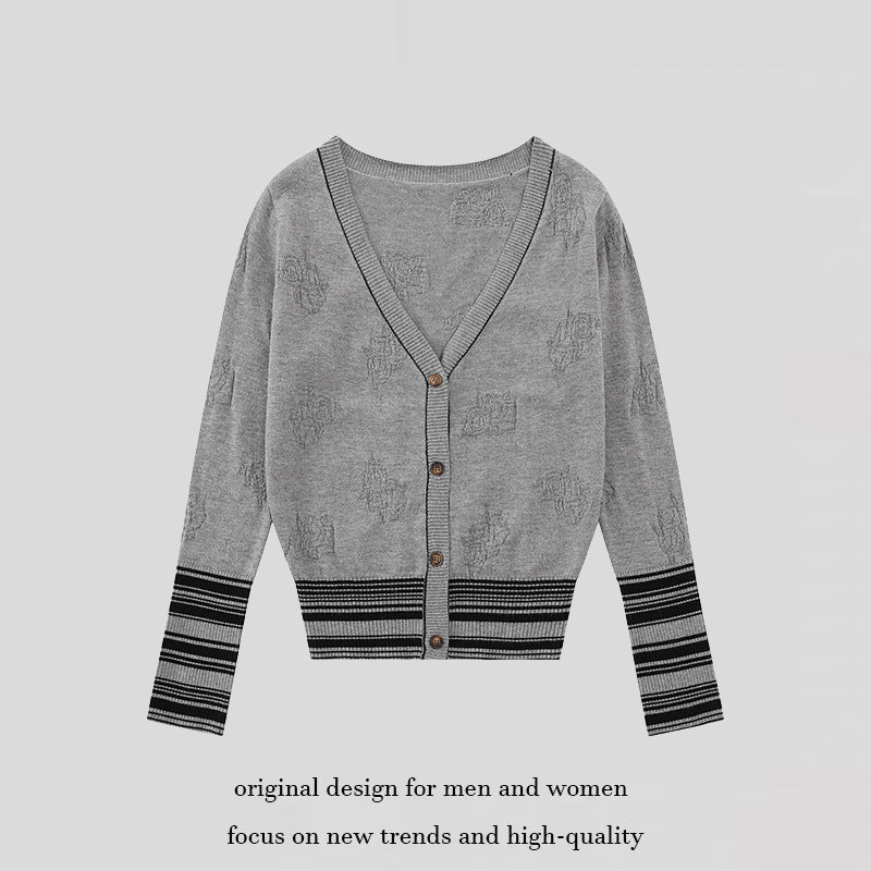 Ladies cardigan with V-neck, fine jacquard pattern and contrasting cuffs Chichicherry