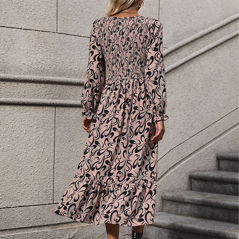 Ladies max dress with smock detail, V-neck and ruffle tiers Chichicherry