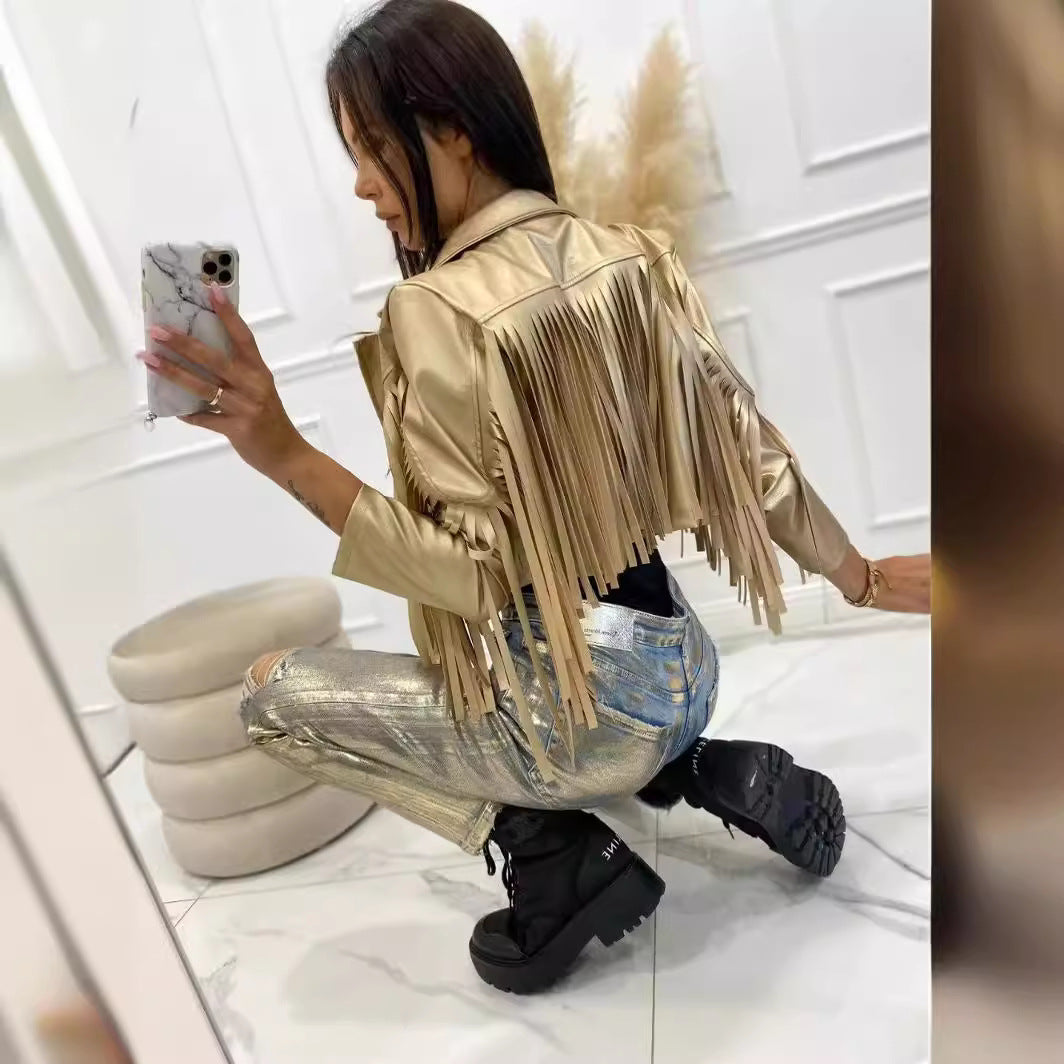 Women’s short jacket in biker style with metallic look and long leather fringes Chichicherry