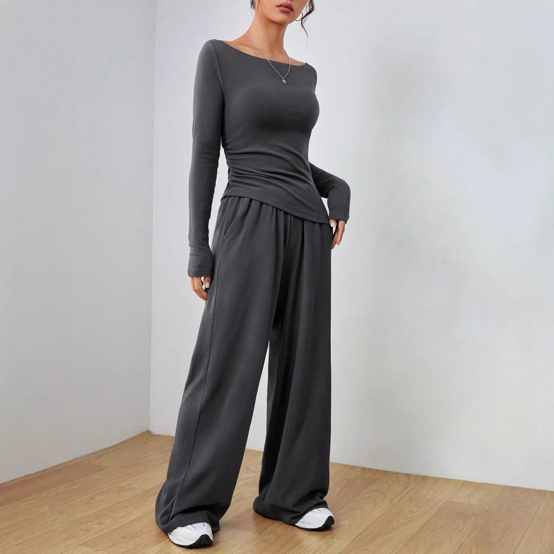 Women’s loungewear set made of softly falling jersey with a boat neckline, fitted long sleeve, and wide palazzo pants Chichicherry