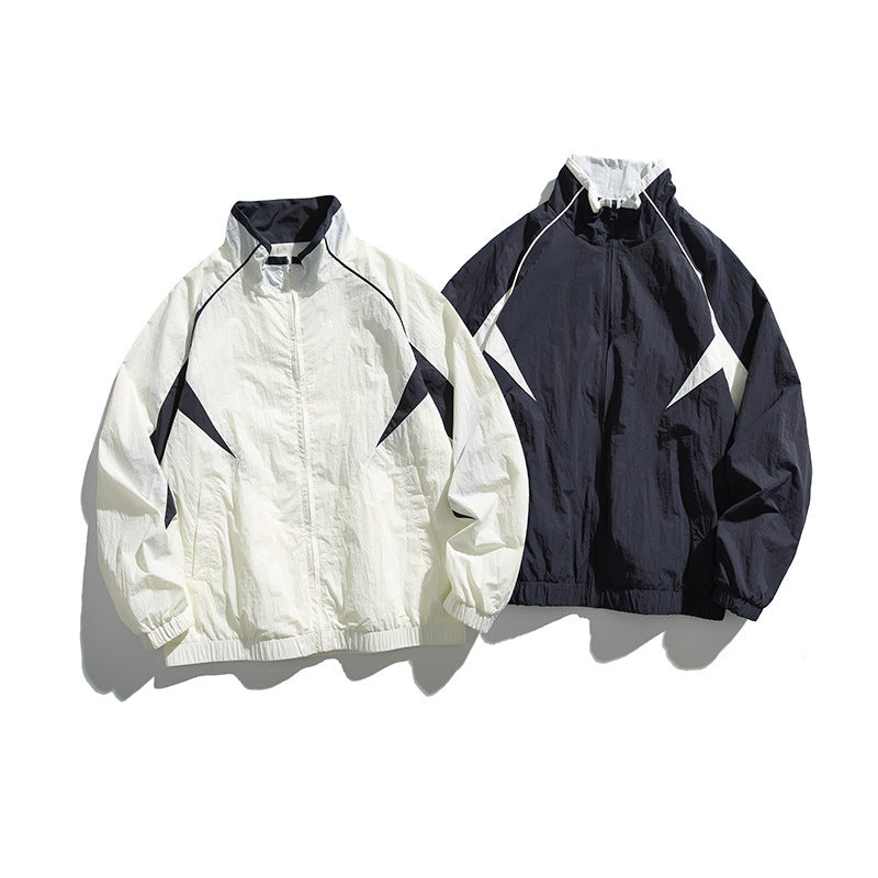 Unisex Lightweight Boxy Hooded Jacket in Windbreaker Style with Contrast Panels and Raglan Sleeves Chichicherry