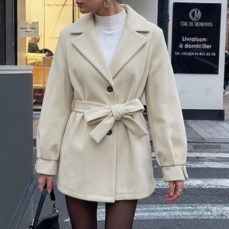 Women's short jacket with belted waist, lapel collar and button placket Chichicherry