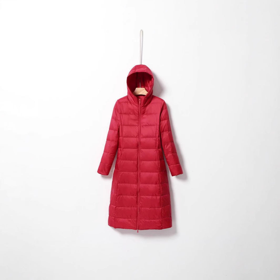 Women's longer quilted coat with hood and light thermal insulation Chichicherry
