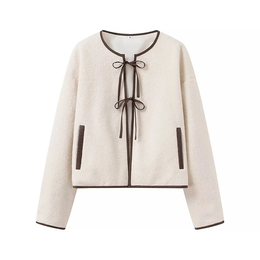 Ladies short cut teddy jacket with tie bands and contrast piping Chichicherry