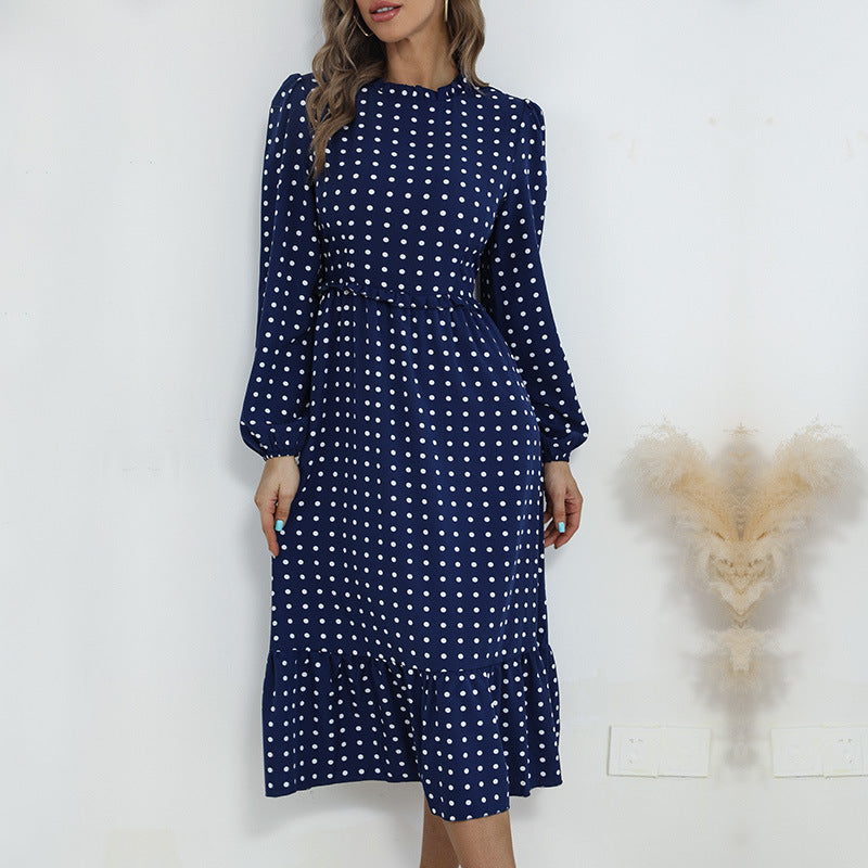 Women's midi dress in retro polka dot style with stand-up collar, tailored gathering, and ruffle trim