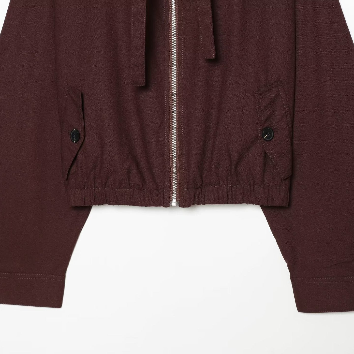 Women's short bomber-style jacket with high funnel collar, concealed zipper, and flap pockets Chichicherry