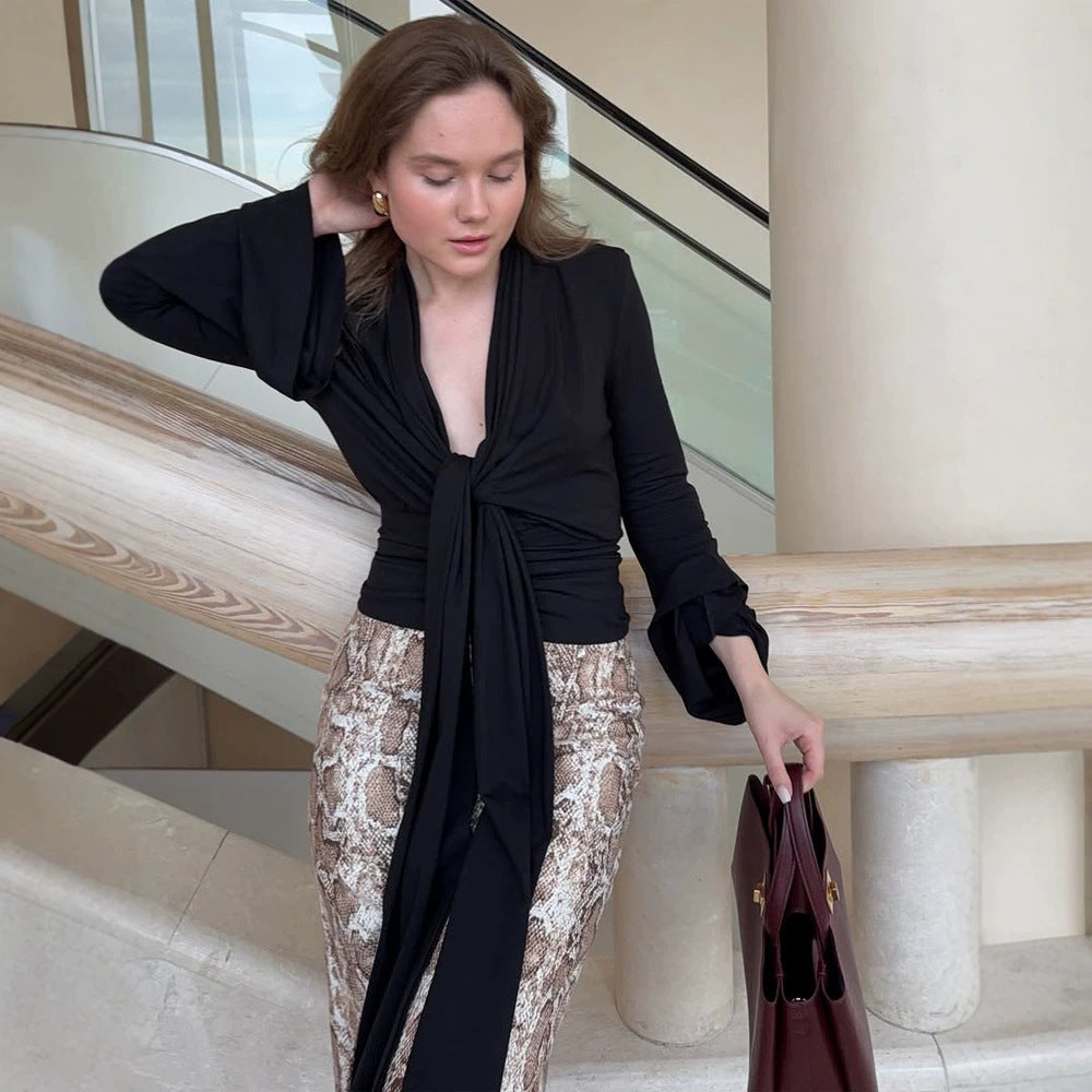 Women's wrap blouse with deep V-neck, long tie ribbons and ruffle sleeves Chichicherry