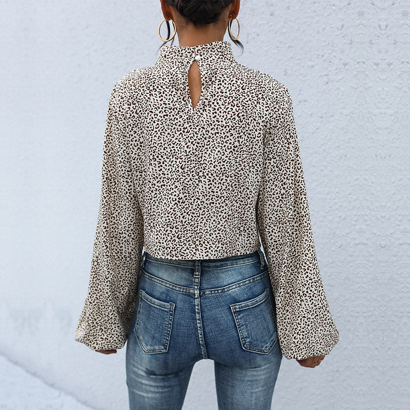 Women's Short Cut Twist Blouse with Stand Collar, Knot Front and Allover Animal Print Chichicherry