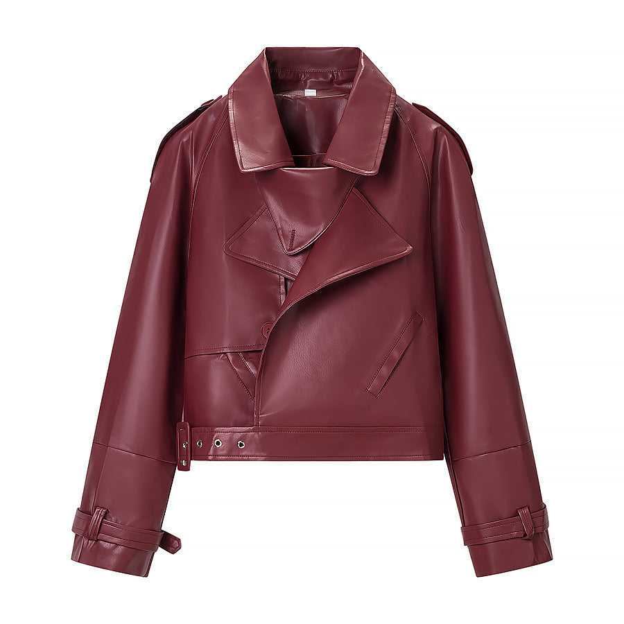 Women short cut biker jacket in leather look with asymmetrical lapel and waist belt Chichicherry