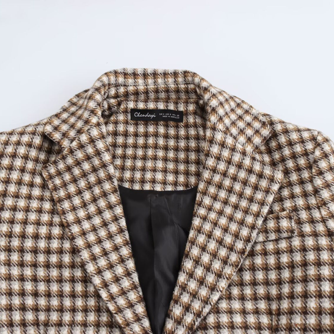 Ladies long-cut checked coat made of wool blend with tailored silhouette, notched collar and flap pockets Chichicherry
