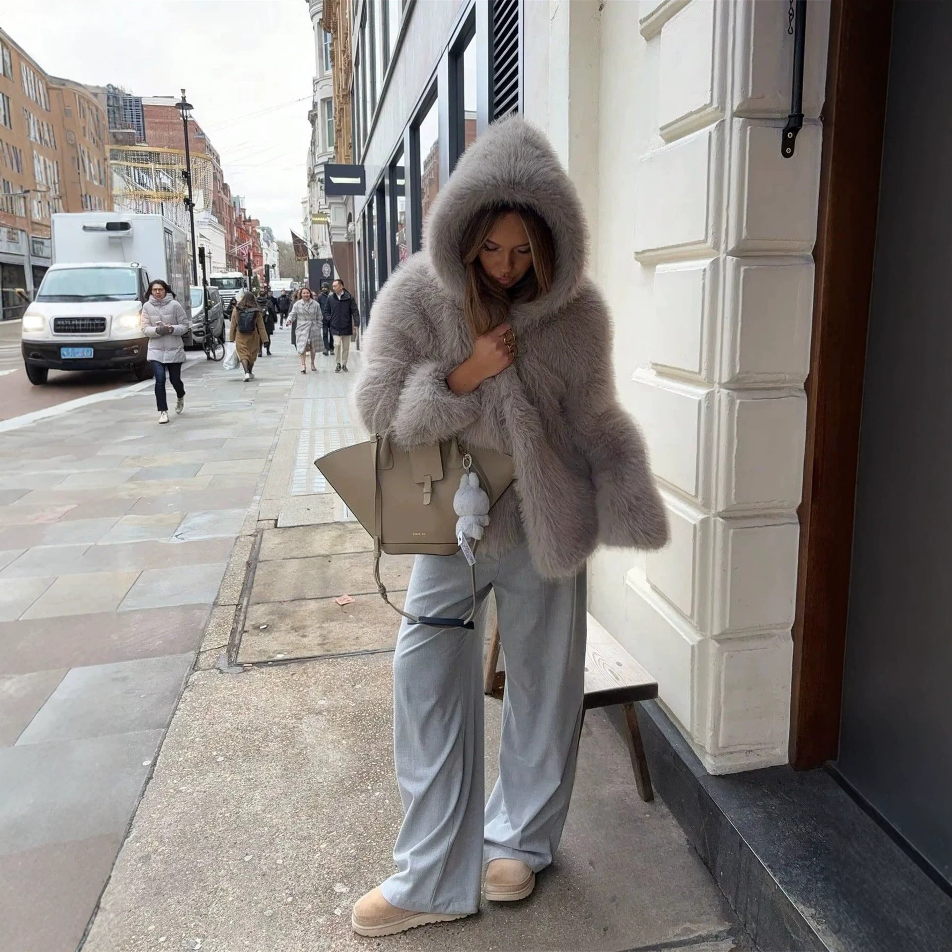 Women's Hooded Faux Fur Short Jacket with Dense Long Pile and Oversize Silhouette Chichicherry