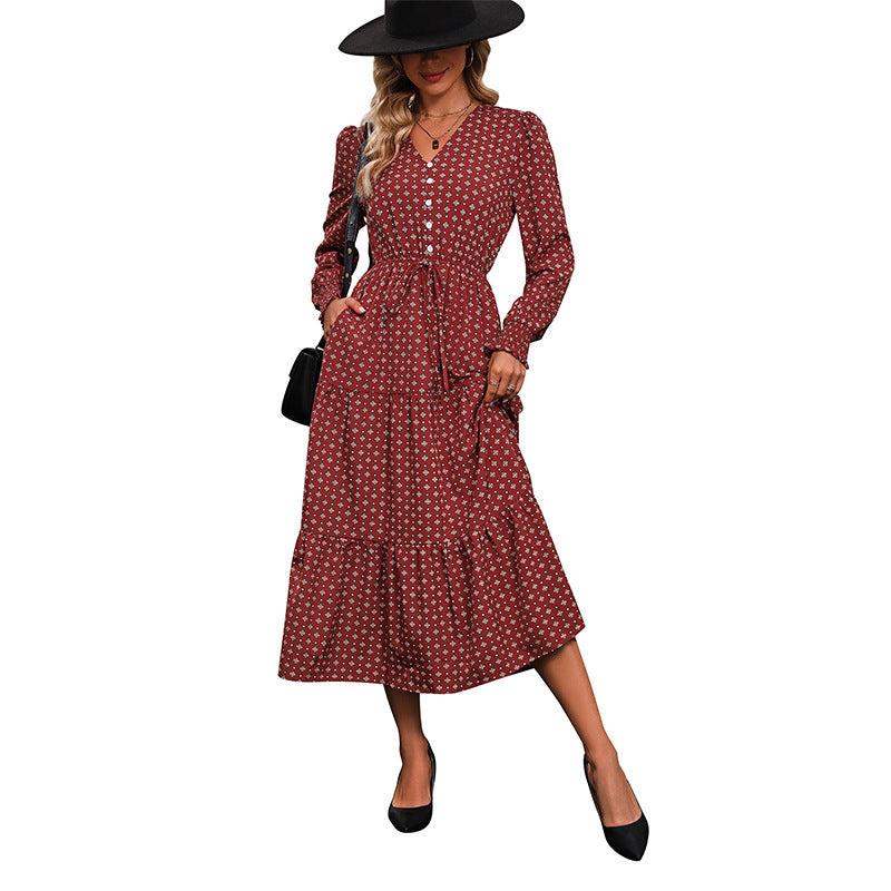 Women's midi dress in boho style with V-neck, button placket, cord tie waist, and tiered ruffle skirt Chichicherry