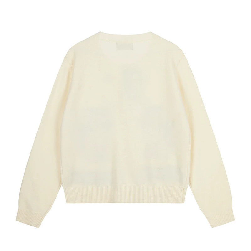 Women's cardigan with cat jacquard, decorative toggle closure and star trim Chichicherry