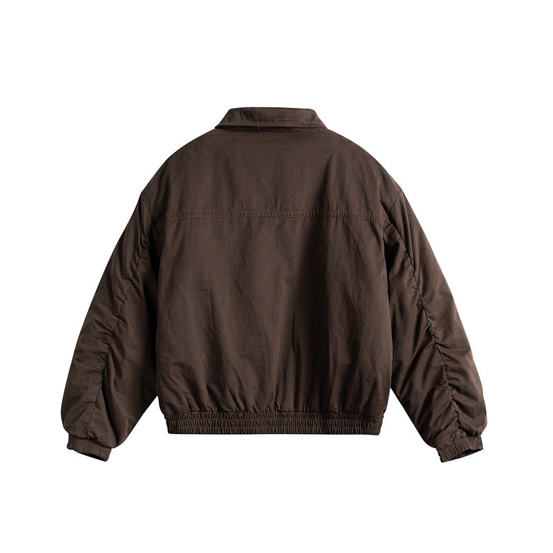 Men's short boxy blouson with shirt collar, utility chest pockets, and elastic hem Chichicherry