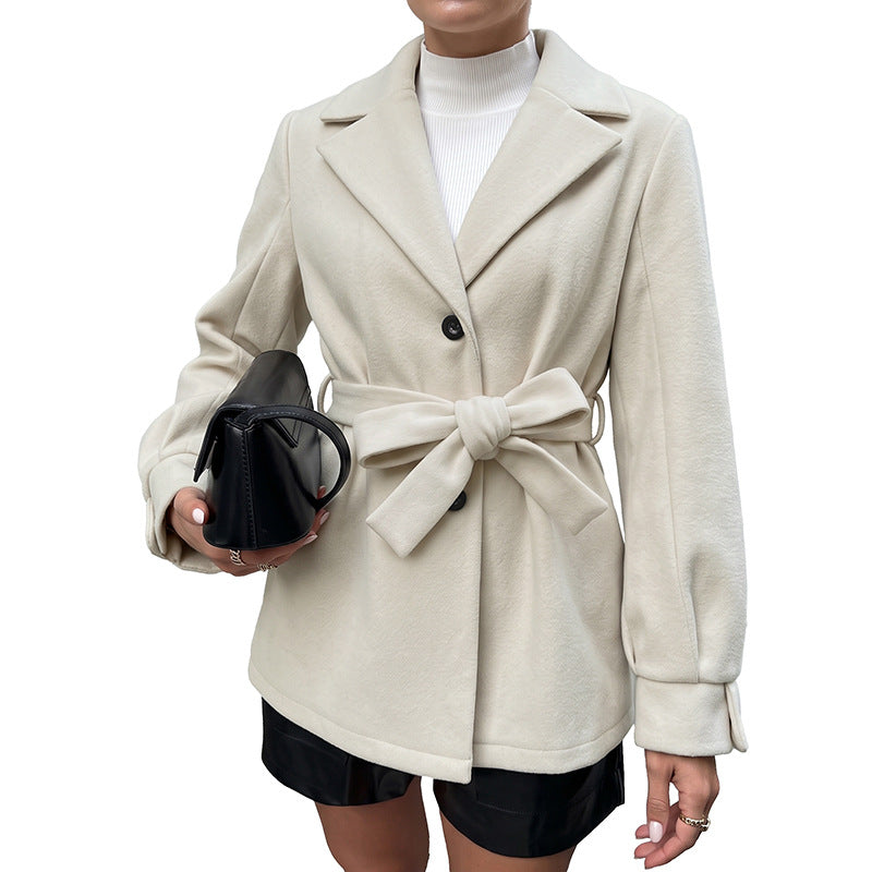 Women's short jacket with belted waist, lapel collar and button placket Chichicherry