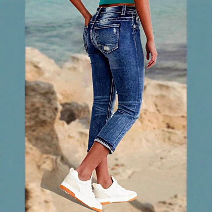 Women's cropped jeans with turn-up, mid-rise waist and used wash Chichicherry