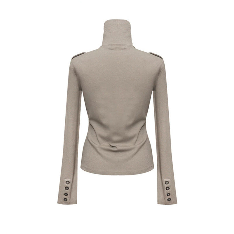 Women's turtleneck top with high turned-over collar, breast flaps and shoulder straps Chichicherry