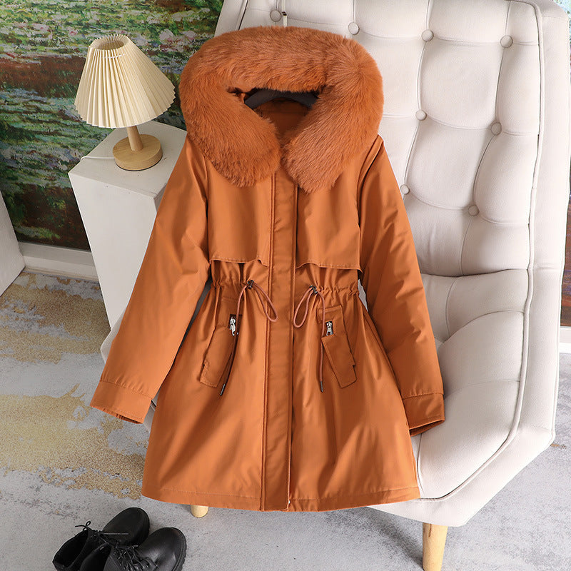 Women's mid-length water-repellent parka with voluminous faux fur collar, waistband drawstring, and multifunctional flap pockets Chichicherry