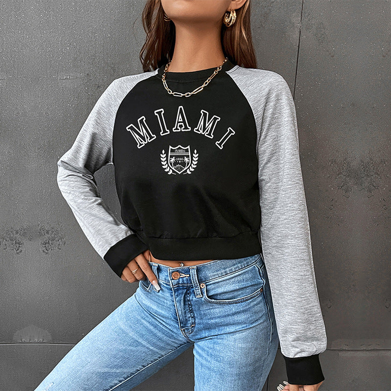 Women Short-Cropped College Sweatshirt with Raglan Sleeves and Elastic Hem Chichicherry