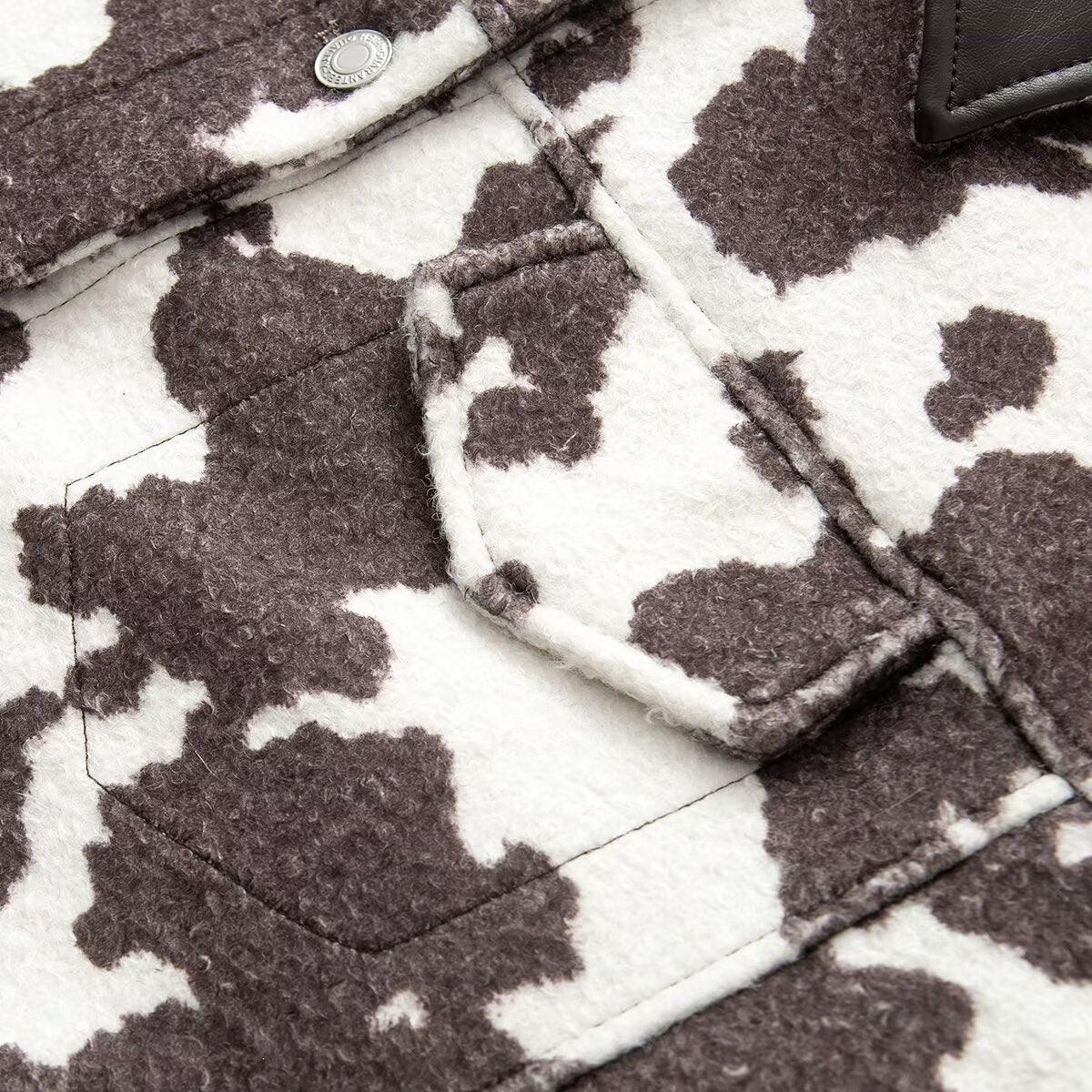 Women’s Short Jacket in Trucker Style with Cow Spot Pattern and Faux Leather Collar Chichicherry