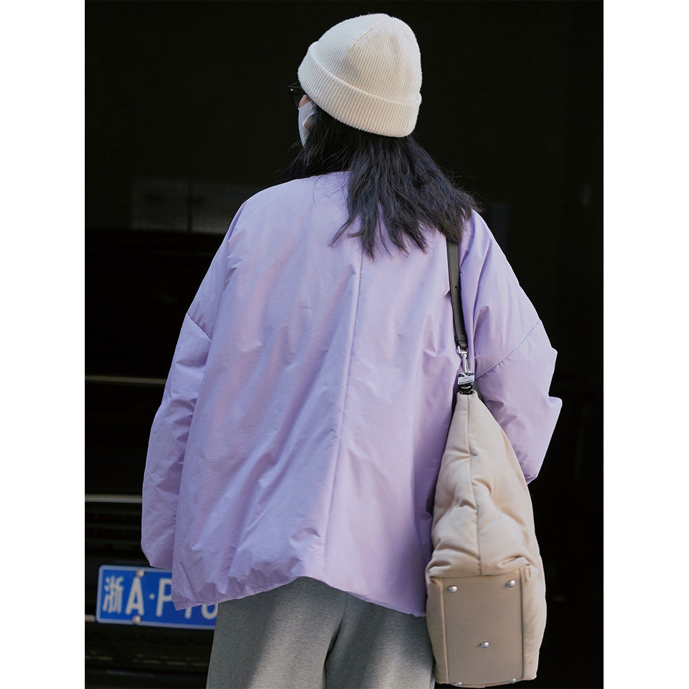 Women's oversized padded quilted jacket with round neck and snap button placket Chichicherry