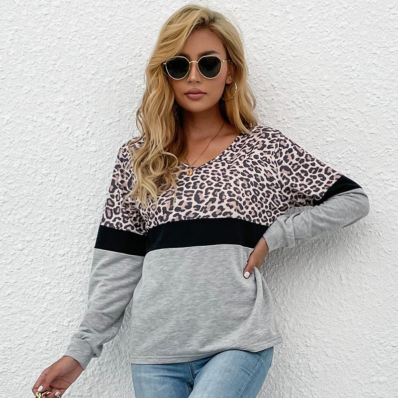 Women's long sleeve shirt with V-neck and leopard print in color block design Chichicherry