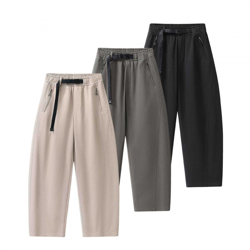 Unisex wide ankle-length cargo pants in relaxed fit with elastic drawstring waistband and zip pockets Chichicherry