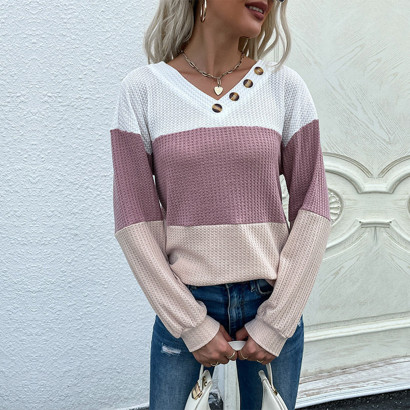 Women's yarn-structured color block pullover with V-neck and decorative button placket Chichicherry