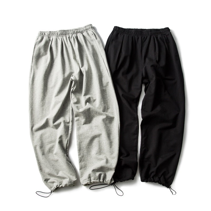 Unisex Relaxed-Fit Jogging Pants with elastic waistband, drawstring, and adjustable hem