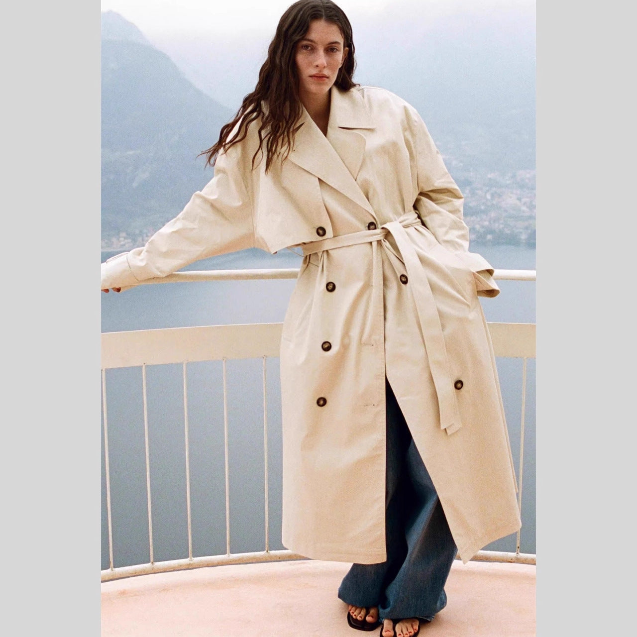 Women's Longer Trench Coat with Double-Breasted Button Placket, Waist Belt and Wide Lapels Chichicherry