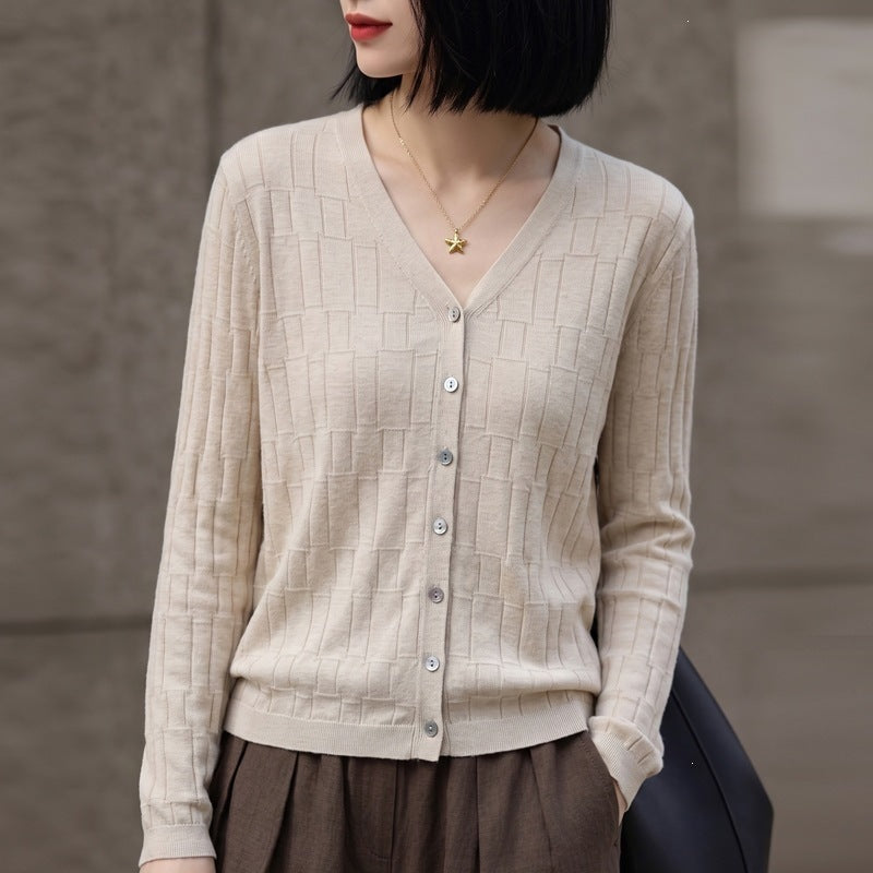 Ladies V-neck fine knit cardigan with structured block design and continuous button placket Chichicherry