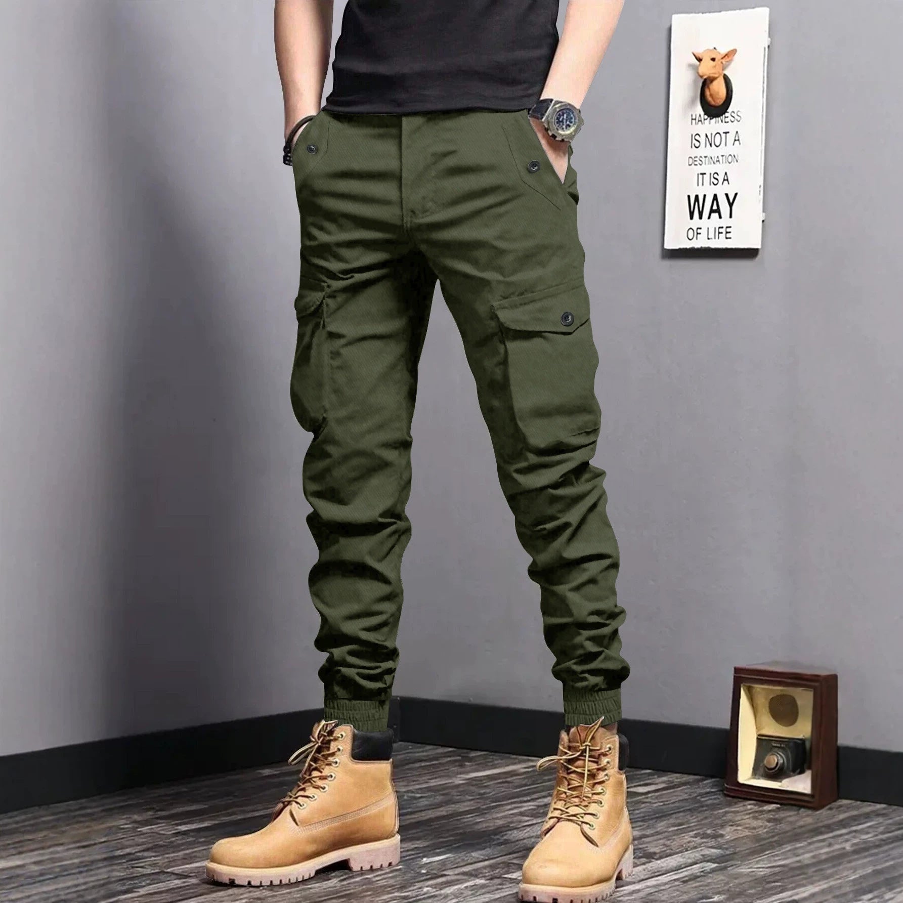 Men's cargo jogger pants with elastic waistband, drawstring, and multifunctional pockets.