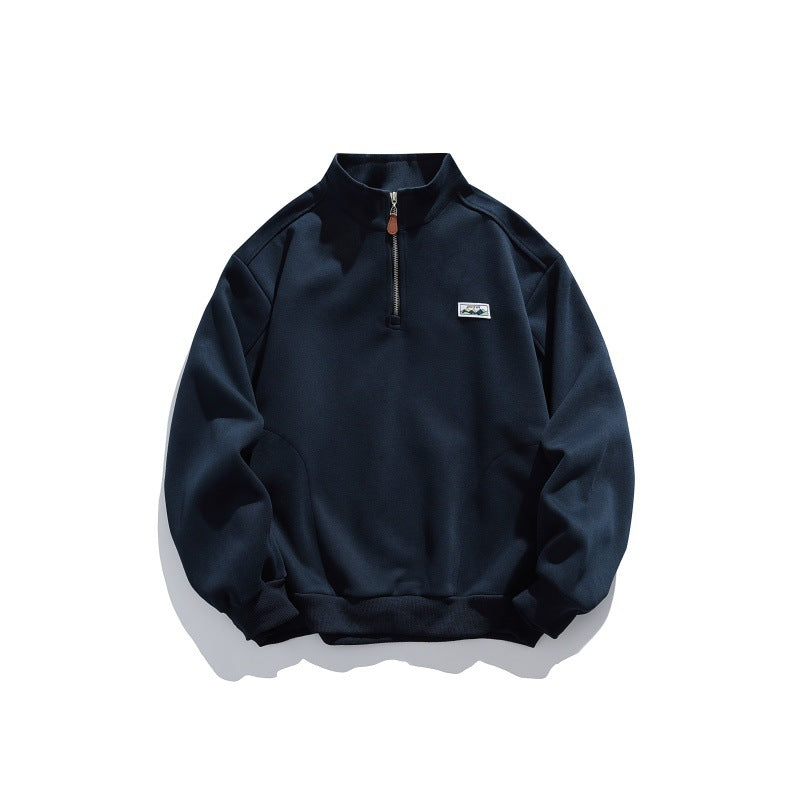 Unisex half-zip sweatshirt with stand-up collar, raglan sleeves, and minimalist chest patch Chichicherry