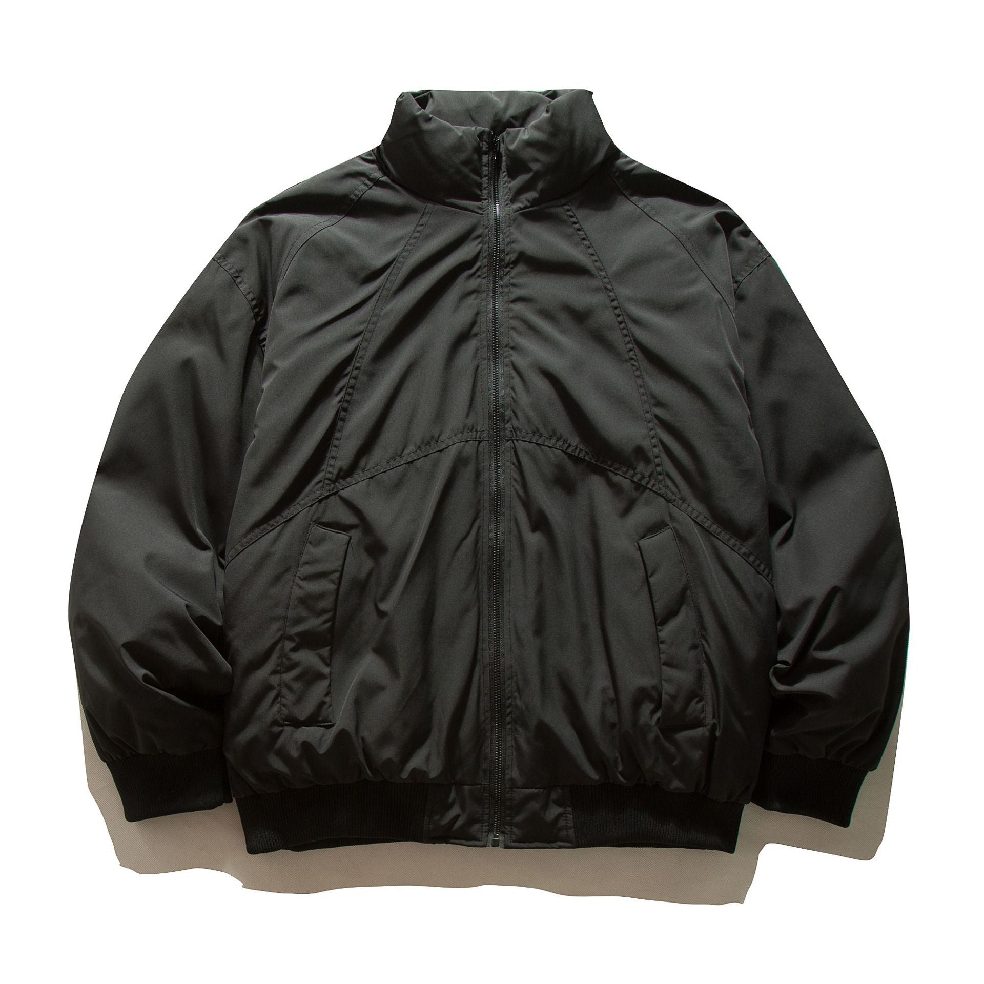 Men's boxy padded bomber jacket with high stand-up collar, elastic hem, and practical side pockets.