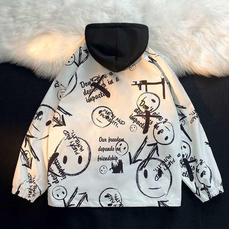 Men's multi-layer transitional jacket with hooded inner layer and smiley graffiti print Chichicherry