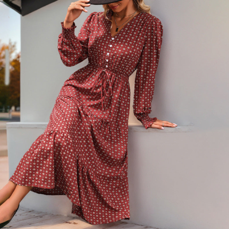 Women's midi dress in boho style with V-neck, button placket, cord tie waist, and tiered ruffle skirt Chichicherry